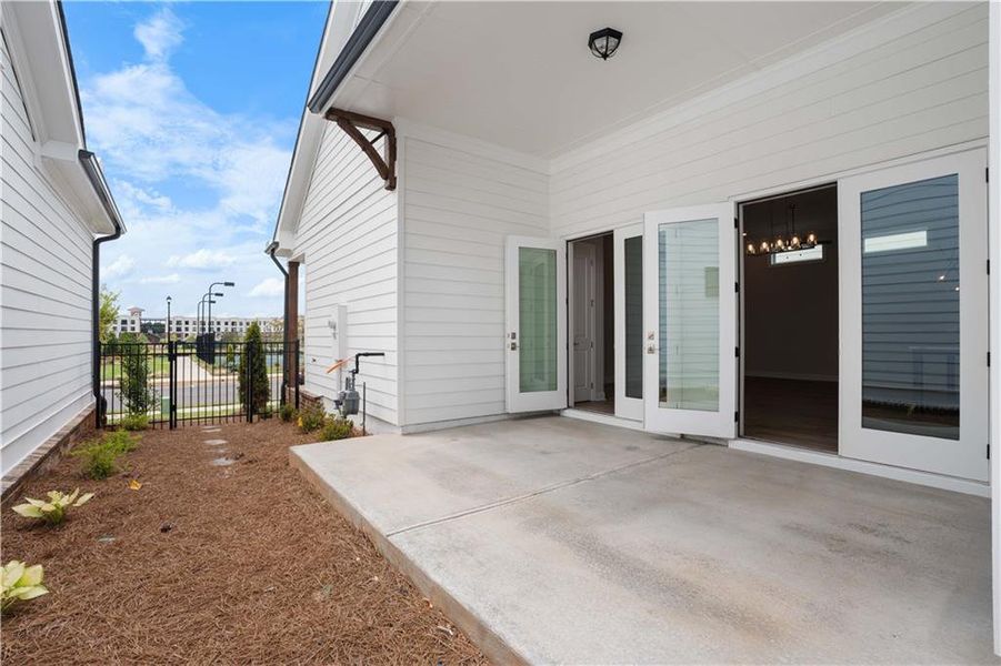 Exterior details and patio area of a home in Promenade at Sawnee Village, Cumming (Image 3). Exterior details and patio area of a home in Promenade at Sawnee Village, Cumming (Image 3).