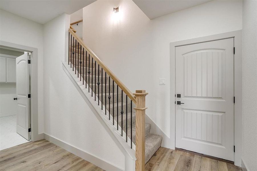 Garage entry and stairs to bedroom/flex space