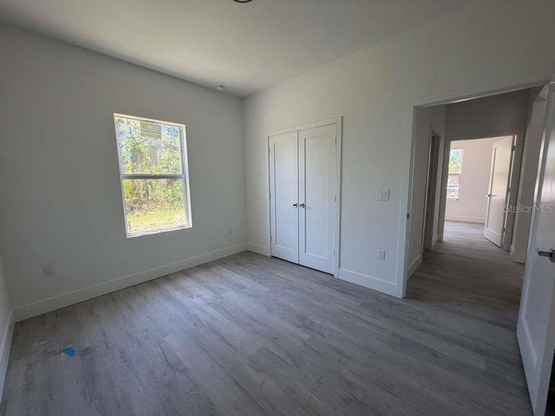 Spacious, unfurnished interior of a new home in , Port Charlotte (Image 17).