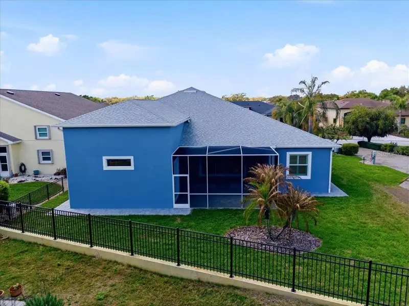 Exterior details and patio area of a home in , Polk City (Image 4).