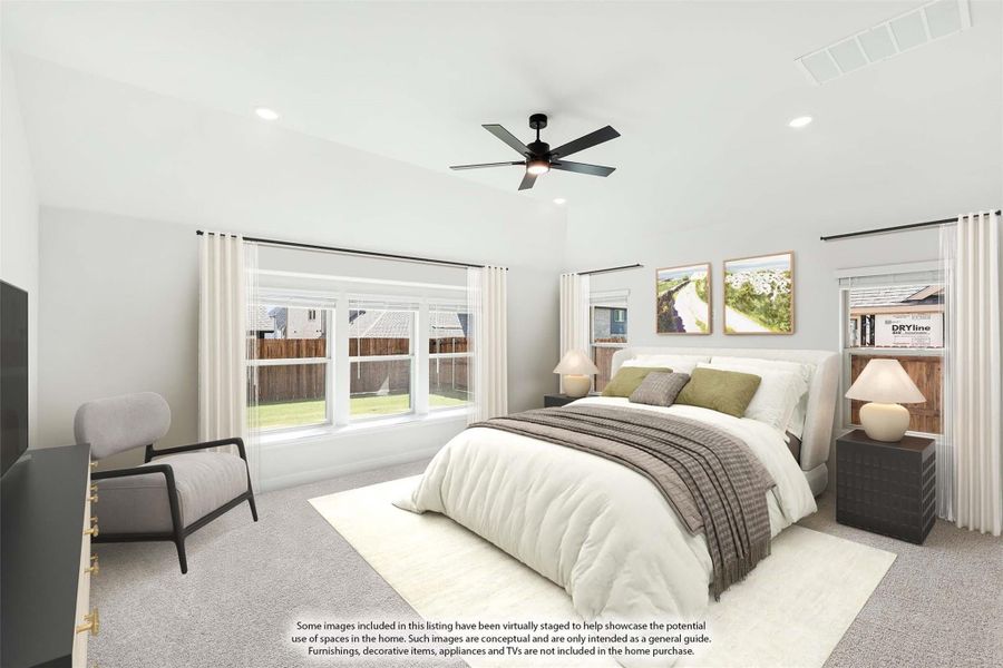 Spacious bedroom with vaulted ceiling, ceiling fan, large windows, and neutral carpet flooring