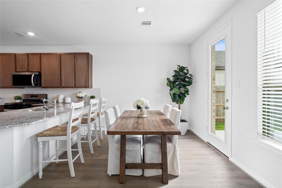 Furnished interior in a model home at Sunterra in Katy (Image 5).