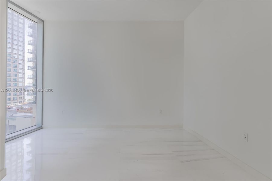 Spacious, unfurnished interior of a new home in Aston Martin Residences, Miami (Image 21).