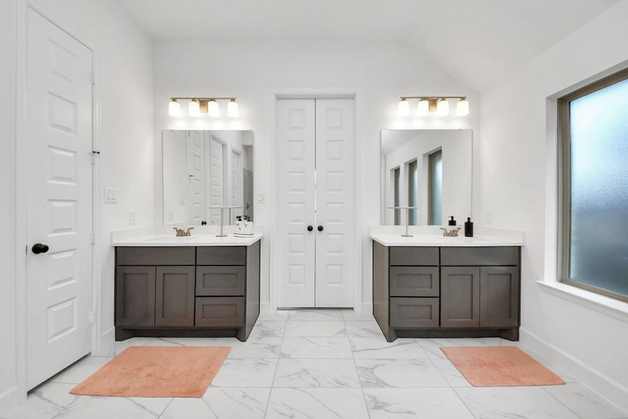 Primary Bathroom showcasing his/her sink Primary Bathroom showcasing his/her sink