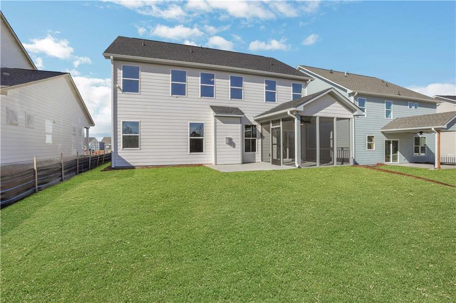 Exterior details and patio area of a home in Twin Lakes, Hoschton (Image 26).