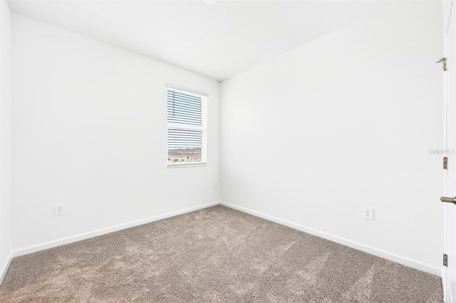Spacious, unfurnished interior of a new home in Tohoqua, Kissimmee (Image 21).
