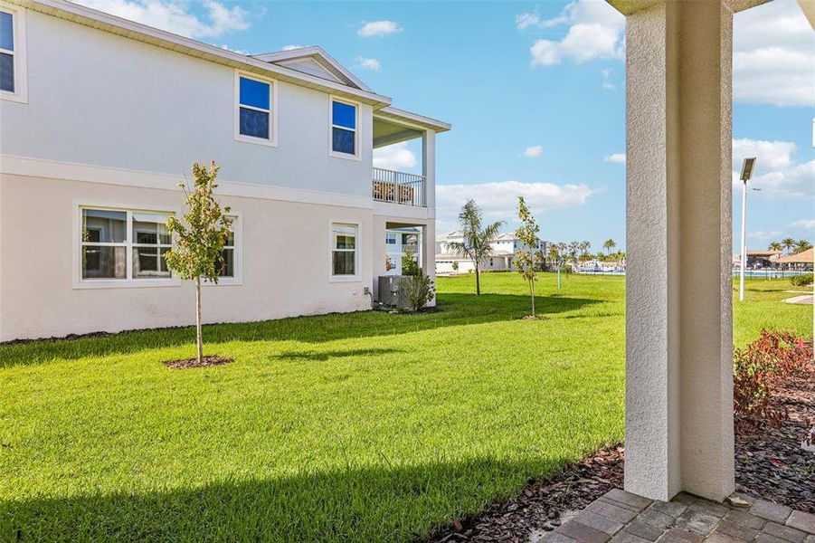 Exterior details and patio area of a home in Lagoon Residences at Epperson, Wesley Chapel (Image 3).