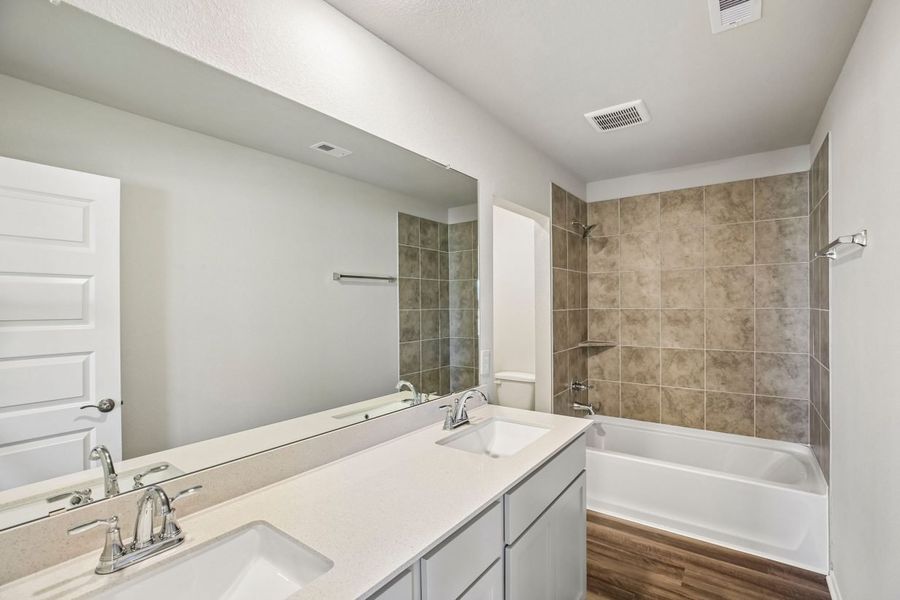 Furnished interior view inside a new home in Mustang Meadows, Waller (Image 13).