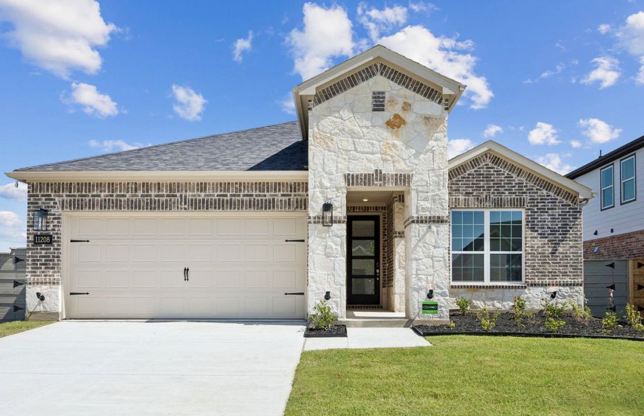 The Emory, a one-story home with 2-car garage, shown with Home Exterior 34