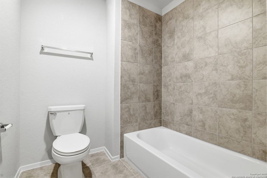 Furnished interior view inside a new home in Hunters Ranch, San Antonio (Image 12).