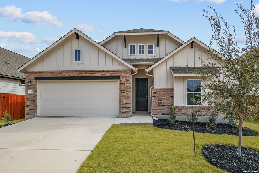 Front exterior of a new home in Megan's Landing, Castroville, TX, highlighting curb appeal (Image 2). Front exterior of a new home in Megan's Landing, Castroville, TX, highlighting curb appeal (Image 2).