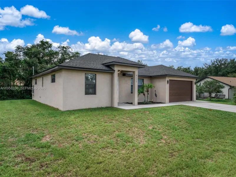 Exterior details and patio area of a home in , Sebring (Image 3).