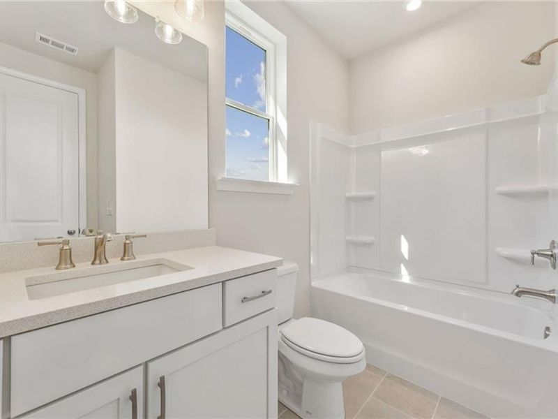 Furnished interior view inside a new home in Melody Lakeside Estates, Buford (Image 4).