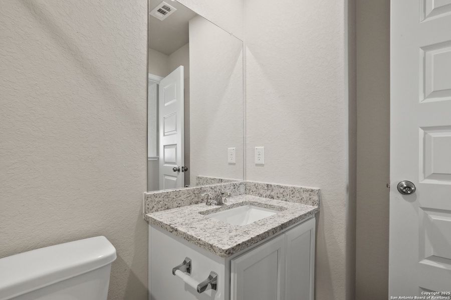 Furnished interior view inside a new home in Hickory Ridge, Elmendorf (Image 6).
