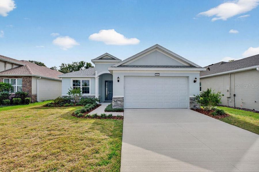 Front exterior of a new home in , Mount Dora, FL, highlighting curb appeal (Image 20).