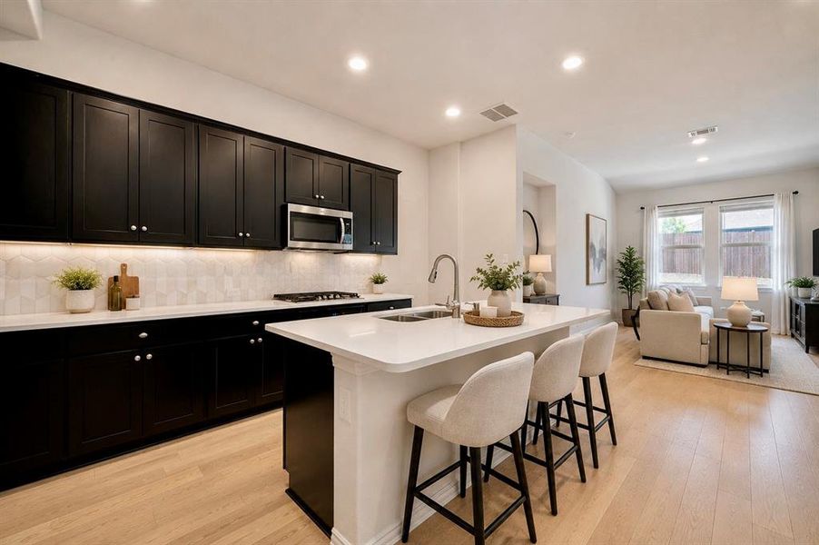 Furnished interior view inside a new home in The Villages of Hurricane Creek, Anna (Image 6).
