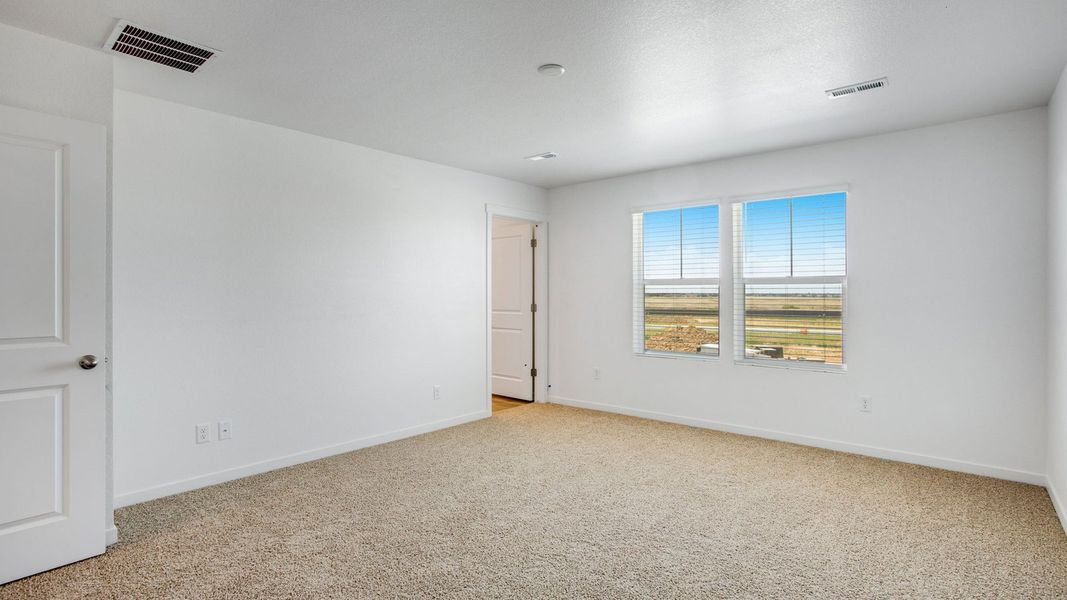 Spacious, unfurnished interior of a new home in Sky Ranch, Watkins (Image 15).