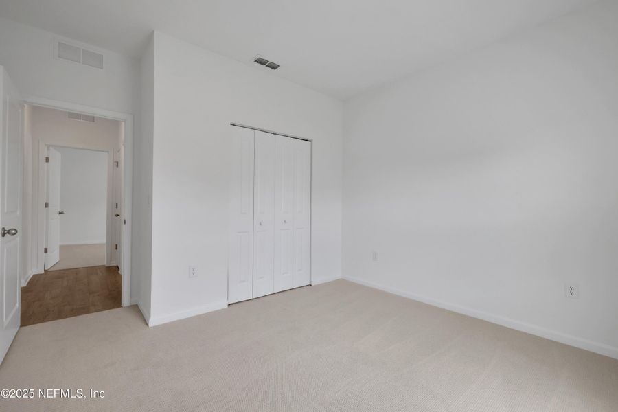 Spacious, unfurnished interior of a new home in Cordova Palms, St. Augustine (Image 31).