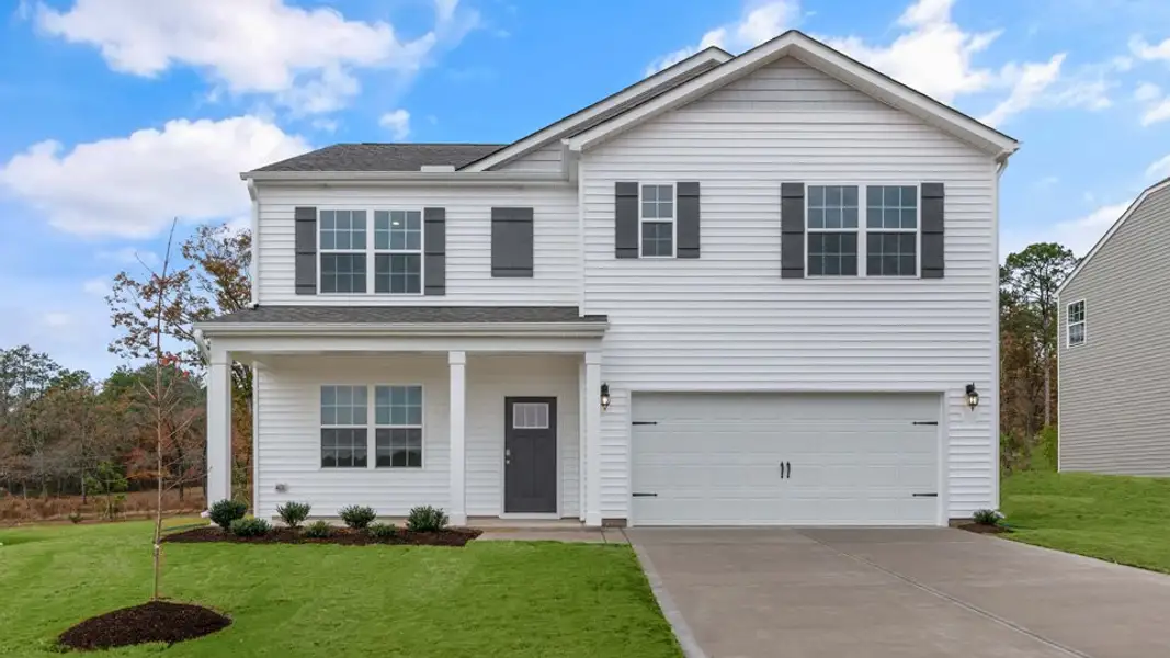 Front exterior of a new home in Lawson Glen, Clayton, NC, highlighting curb appeal (Image 1). Front exterior of a new home in Lawson Glen, Clayton, NC, highlighting curb appeal (Image 1).