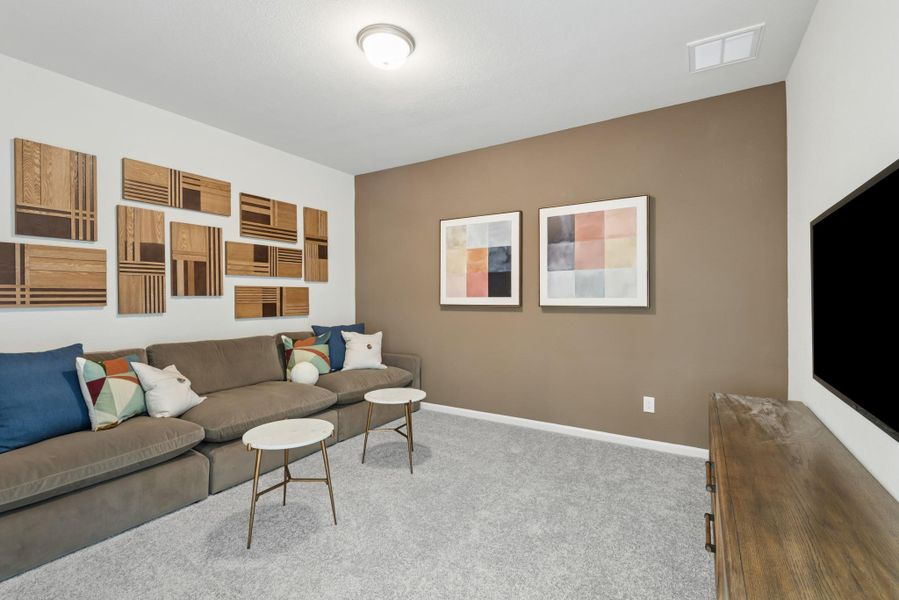 The Princeton II- Media Room. Staged model home shown for illustration only; actual features, colors, and upgrades may vary.