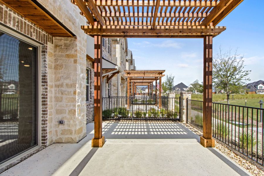 Exterior details and patio area of a home in The Tribute, The Colony (Image 3). Exterior details and patio area of a home in The Tribute, The Colony (Image 3).