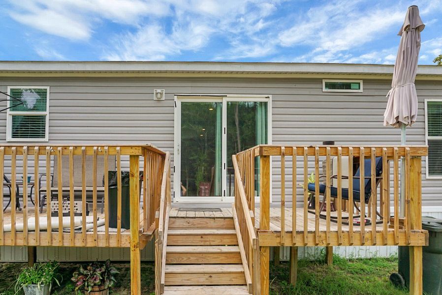Front exterior of a new home in , Bonneau, SC, highlighting curb appeal (Image 25).