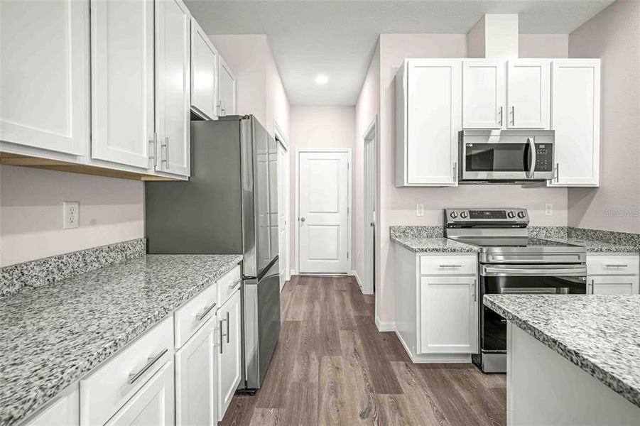 Furnished interior view inside a new home in , Weeki Wachee (Image 9).