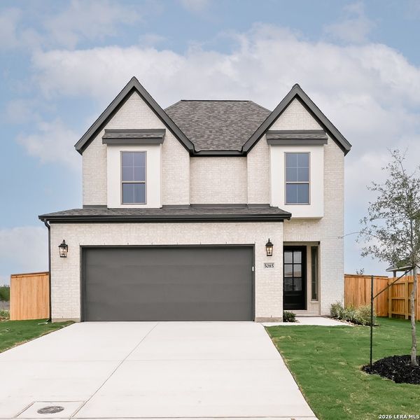 Front exterior of a new home in The Parklands, Schertz, TX, highlighting curb appeal (Image 21). Front exterior of a new home in The Parklands, Schertz, TX, highlighting curb appeal (Image 21).