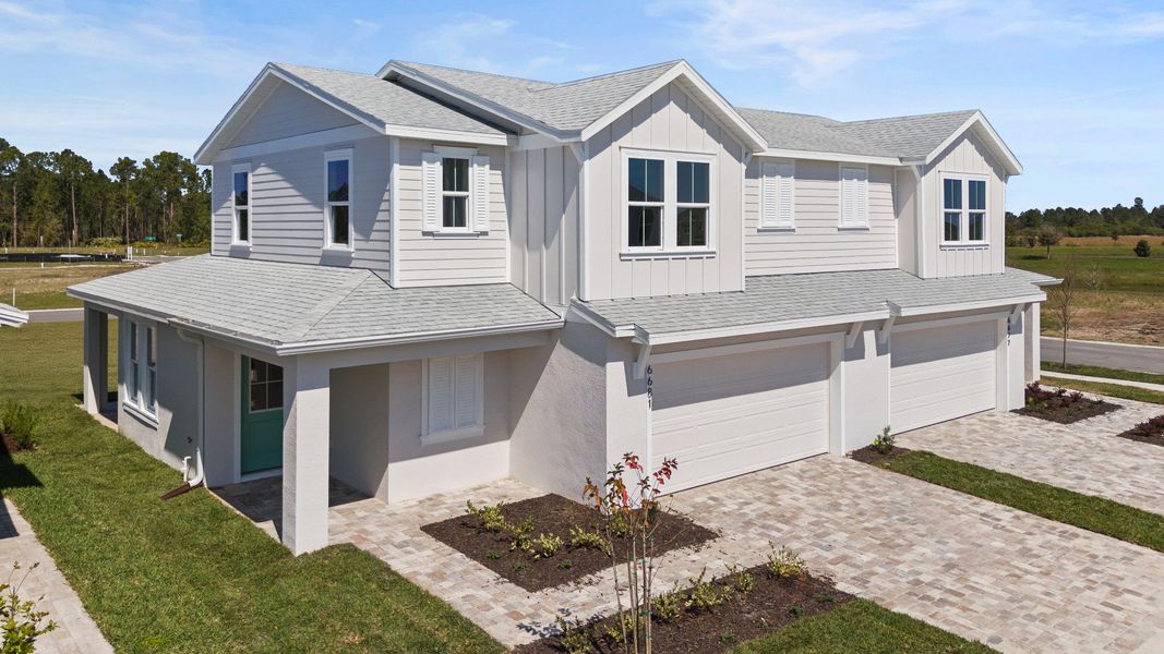Representative exterior photo of a completed home built from the Coronado - End by DRB Homes in Cyrene at Harmony, St. Cloud, FL (Image 25).