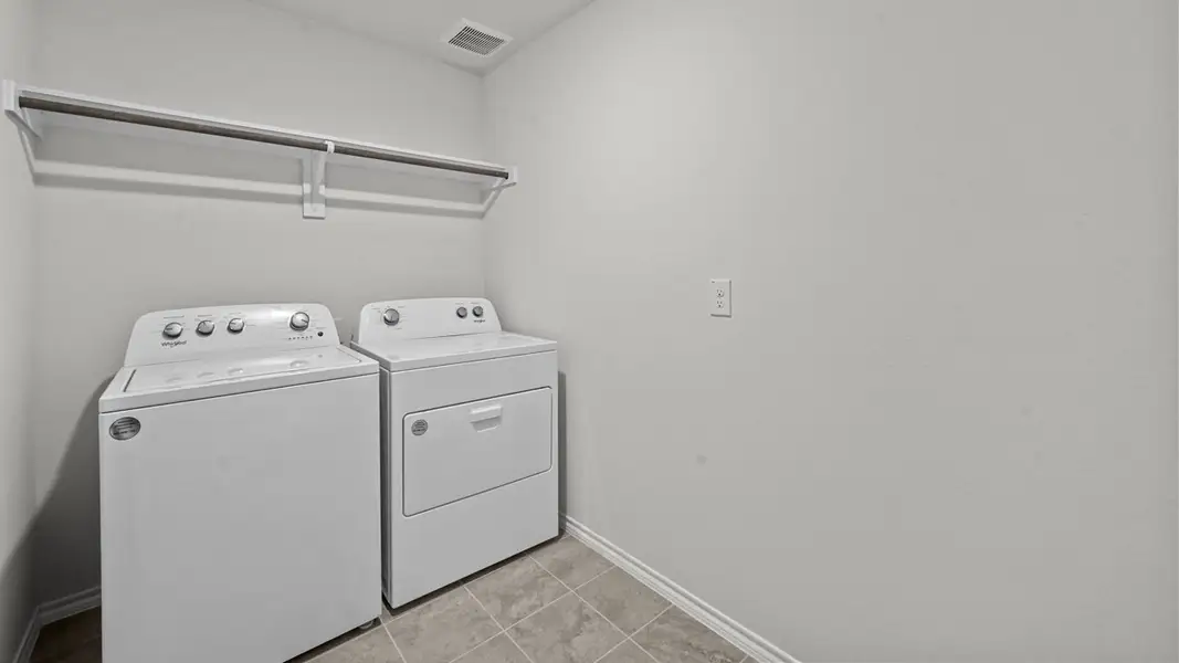 Furnished interior view inside a new home in Valor Farms, Royse City (Image 16).