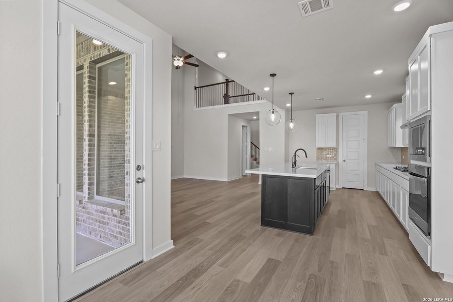 Furnished interior view inside a new home in Nopal Valley, San Antonio (Image 16).
