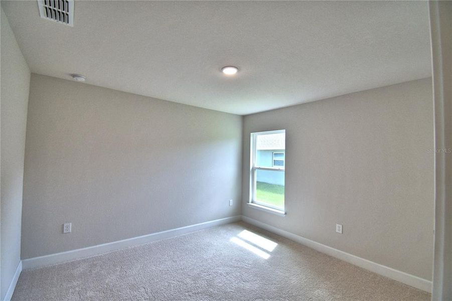 Spacious, unfurnished interior of a new home in Cadence Crossing, Auburndale (Image 63).