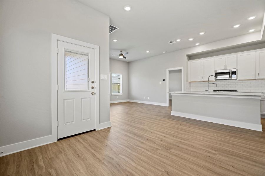 Bright dining area perfectly positioned between the kitchen and living room for easy flow.