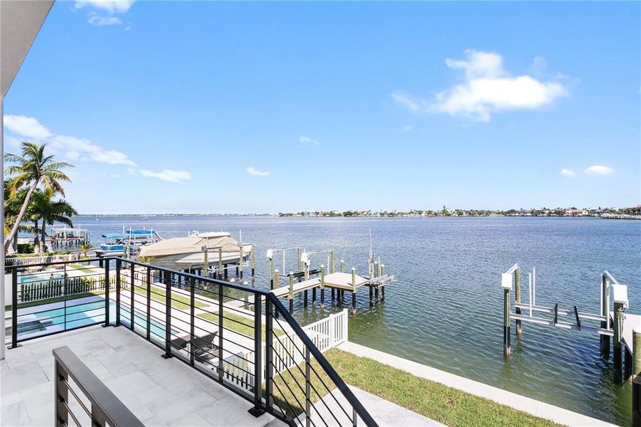 2nd level stairway to covered balcony with water views