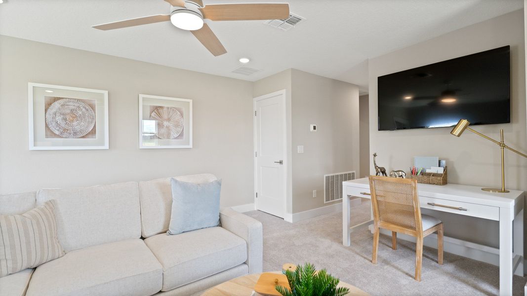Representative furnished interior of a home built from the Sweetgum by DRB Homes in Trailside, Mount Dora (Image 61).