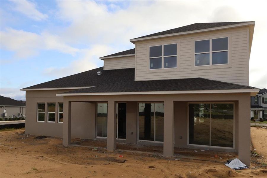 Exterior details and patio area of a home in Emerson Pointe, Apopka (Image 14). Exterior details and patio area of a home in Emerson Pointe, Apopka (Image 14).