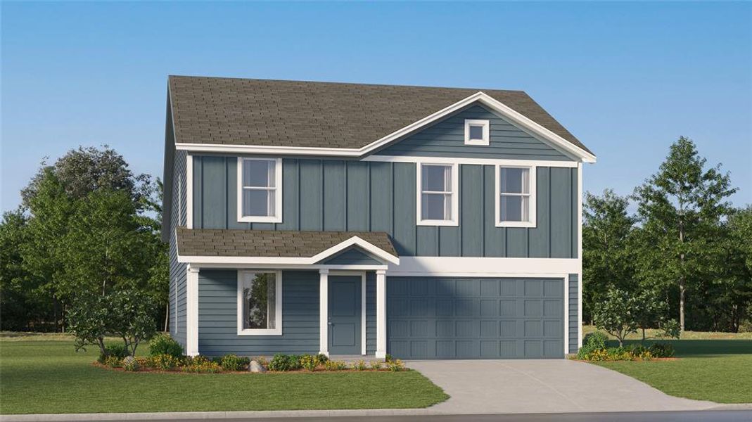 View of front of property featuring a garage and a front lawn