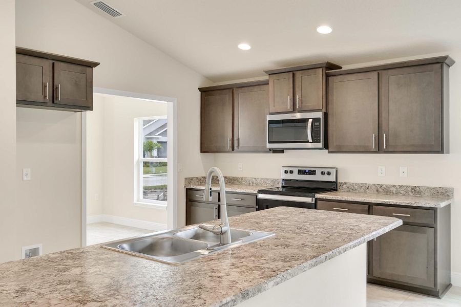 Representative furnished interior of a home built from the 1780 by Adams Homes in Ricker Estates, Jacksonville (Image 6). Representative furnished interior of a home built from the 1780 by Adams Homes in Ricker Estates, Jacksonville (Image 6).
