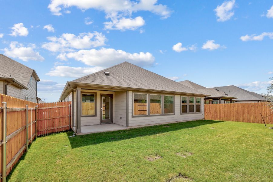 Exterior details and patio area of a home in Prairie Winds, Hutto (Image 19).