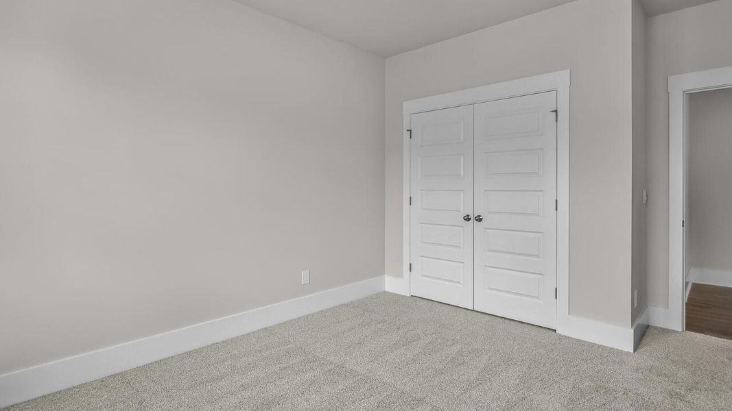 Spacious, unfurnished interior of a new home in Indigo Preserve, Leland (Image 23).