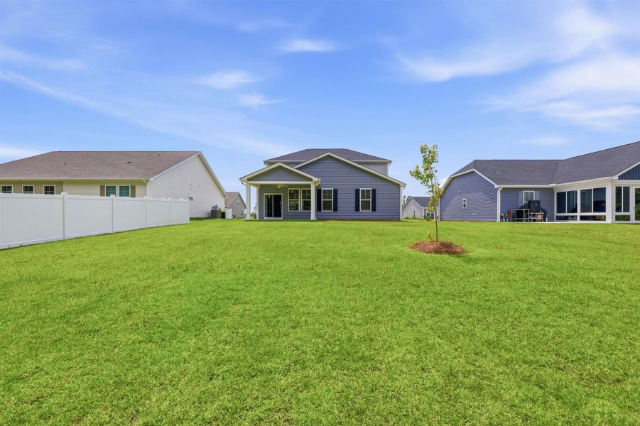 Exterior details and patio area of a home in Westfield, Conway (Image 33).