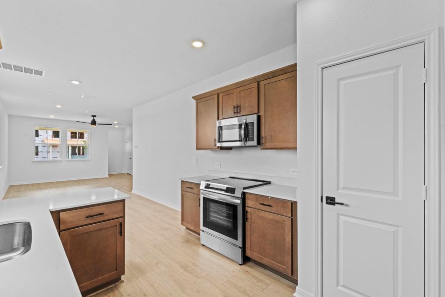 Furnished interior view inside a new home in Avery Centre, Round Rock (Image 6).