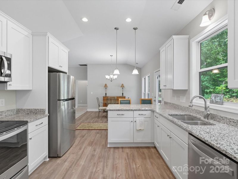 Furnished interior view inside a new home in , Wingate (Image 16).