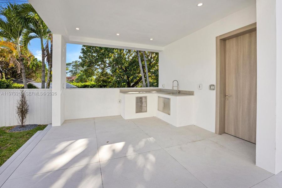 Exterior details and patio area of a home in , Miami Springs (Image 21).