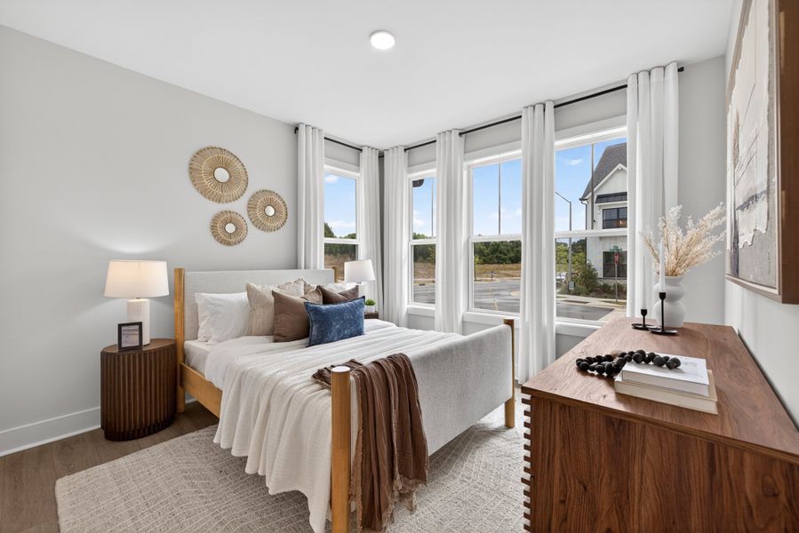 Representative furnished interior of a home built from the Cora End Unit by Baker Residential in Atwater Station - Midtown Collection, Fuquay Varina (Image 20). Representative furnished interior of a home built from the Cora End Unit by Baker Residential in Atwater Station - Midtown Collection, Fuquay Varina (Image 20).