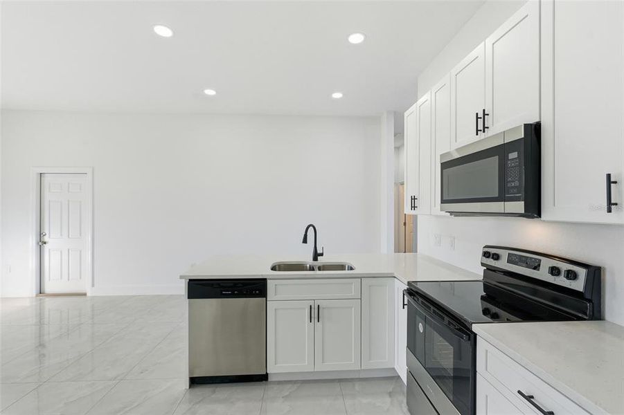Furnished interior view inside a new home in , Port Charlotte (Image 3).