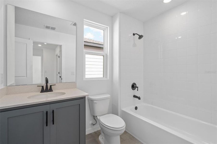 Furnished interior in a model home at Ellington Classical in St. Cloud (Image 18).