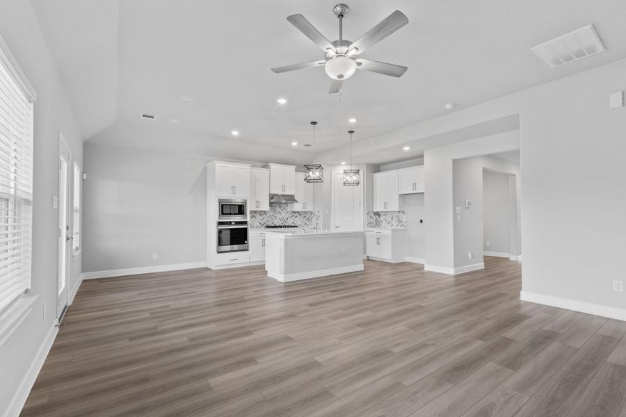 View of nook and kitchen from living room. View of nook and kitchen from living room.