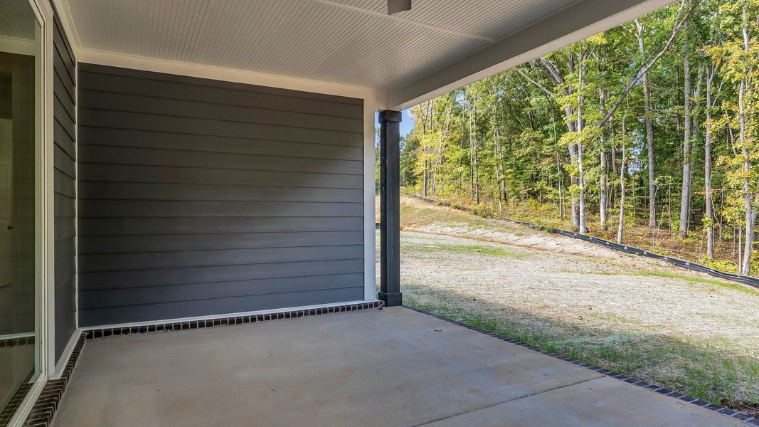 Exterior details and patio area of a home in Brush Creek, Fairview (Image 4).