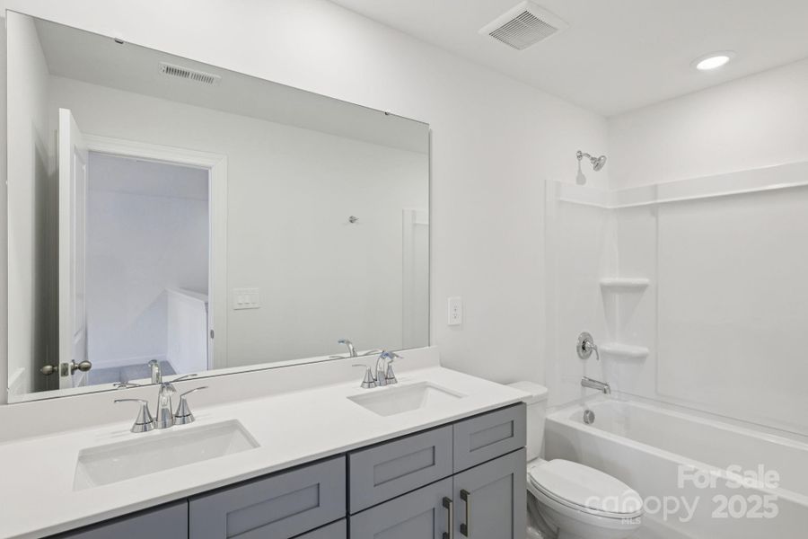 Photo is not of the actual home, but is an inspirational photo of builder’s model home and may depict options, furnishings, and/or decorator features that are not included